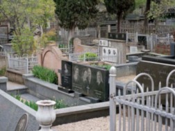 Pictures and padlocks of about 20 people were found at the cemetery in Kutaisi