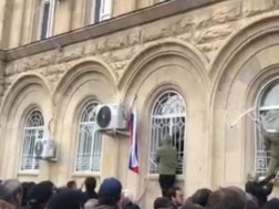 In occupied Abkhazia, protesters stormed the parliament