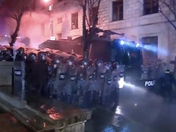 The law enforcement officers started using water jets to break up the ongoing protest action near the Parliament