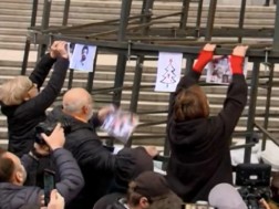 The 11th day of non-stop protest - demonstrators stuck photos of the injured on the Christmas tree structure in front of the Parliament