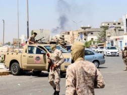 Clashes are taking place between government forces and armed groups in Tripoli