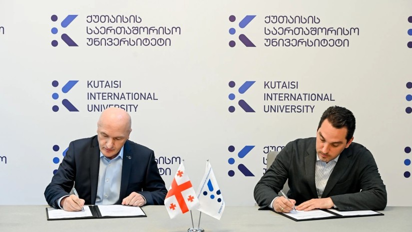ქიუ