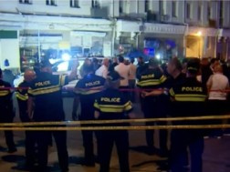 What is the situation near the station square where the facade of the building collapses