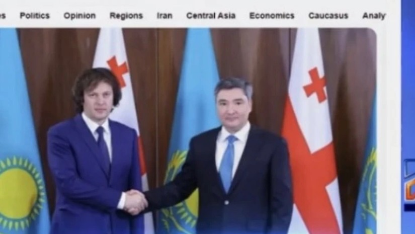 მი